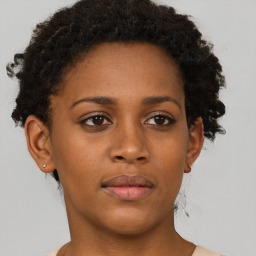 Neutral black young-adult female with short  brown hair and brown eyes