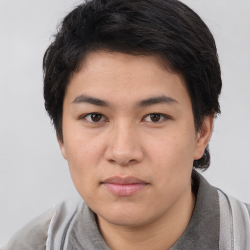 Neutral white young-adult male with short  black hair and brown eyes