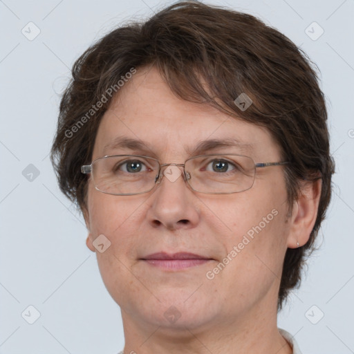 Joyful white adult female with short  brown hair and brown eyes