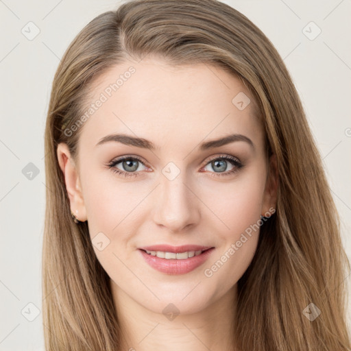 Joyful white young-adult female with long  brown hair and green eyes