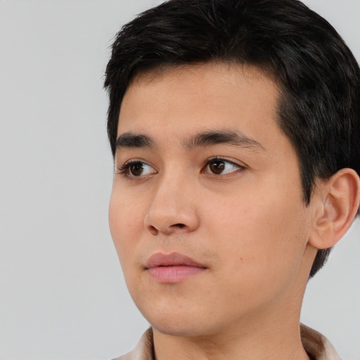 Neutral white young-adult male with short  black hair and brown eyes