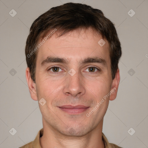 Joyful white adult male with short  brown hair and brown eyes