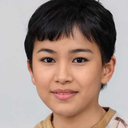 Joyful asian young-adult female with short  black hair and brown eyes