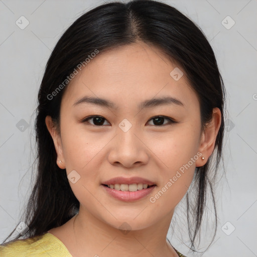 Joyful asian young-adult female with medium  brown hair and brown eyes