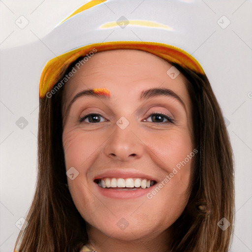 Joyful white young-adult female with long  brown hair and blue eyes