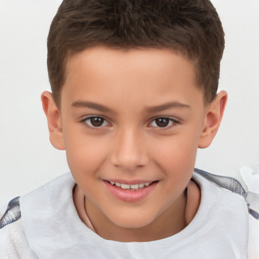 Joyful white child male with short  brown hair and brown eyes