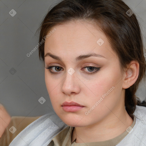 Neutral white young-adult female with medium  brown hair and brown eyes