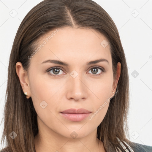 Neutral white young-adult female with long  brown hair and brown eyes