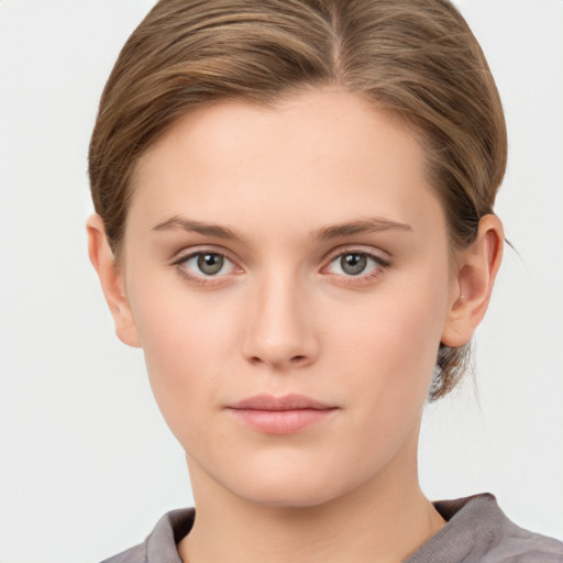 Neutral white young-adult female with medium  brown hair and grey eyes