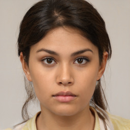 Neutral asian young-adult female with medium  brown hair and brown eyes