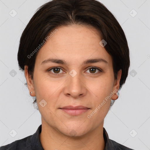 Joyful white adult female with medium  brown hair and brown eyes