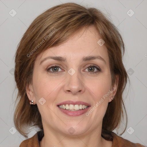 Joyful white adult female with medium  brown hair and grey eyes