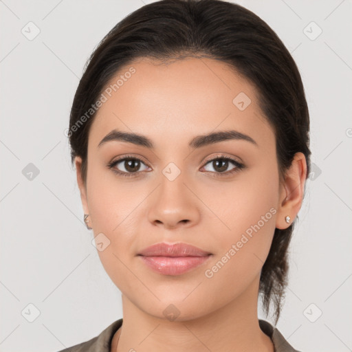 Neutral white young-adult female with long  brown hair and brown eyes