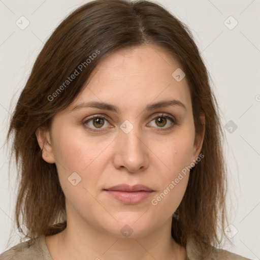 Joyful white young-adult female with medium  brown hair and green eyes