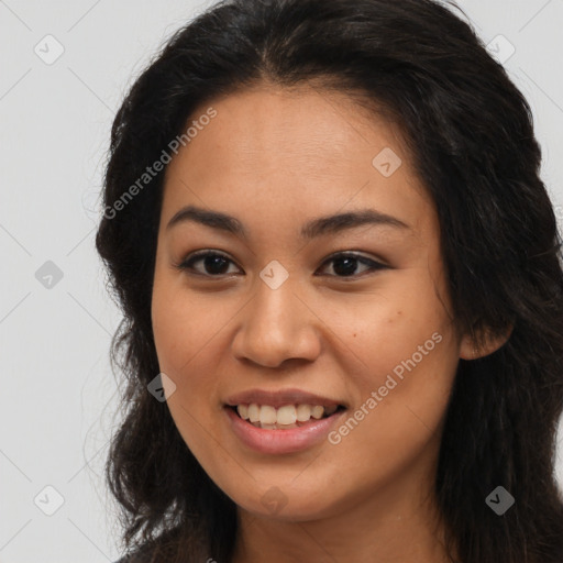 Joyful latino young-adult female with long  brown hair and brown eyes