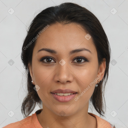 Joyful latino young-adult female with medium  brown hair and brown eyes