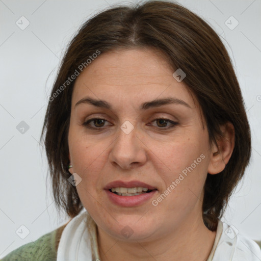 Joyful white adult female with medium  brown hair and brown eyes