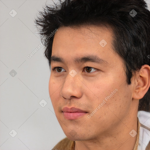 Neutral white young-adult male with short  black hair and brown eyes