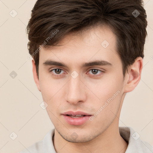 Neutral white young-adult male with short  brown hair and brown eyes