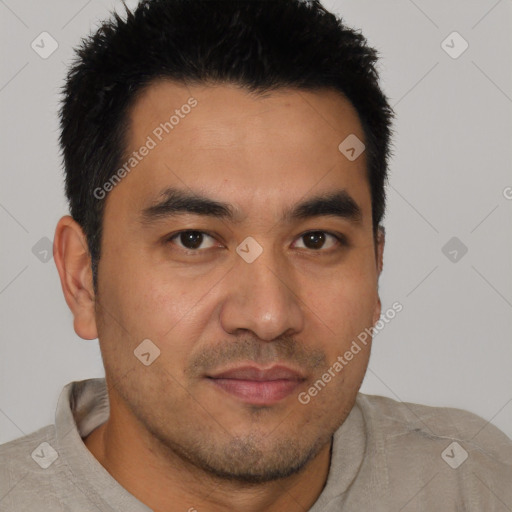 Joyful latino young-adult male with short  black hair and brown eyes