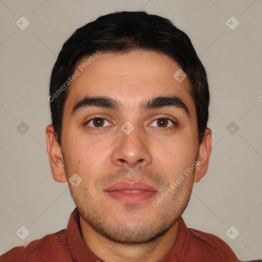 Joyful white young-adult male with short  black hair and brown eyes