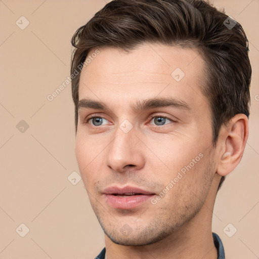 Neutral white young-adult male with short  brown hair and brown eyes