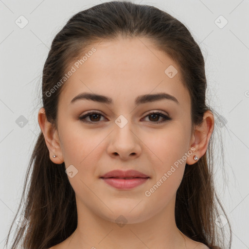 Joyful white young-adult female with long  brown hair and brown eyes