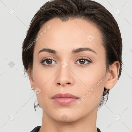 Neutral white young-adult female with medium  brown hair and brown eyes