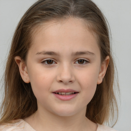 Joyful white child female with medium  brown hair and brown eyes