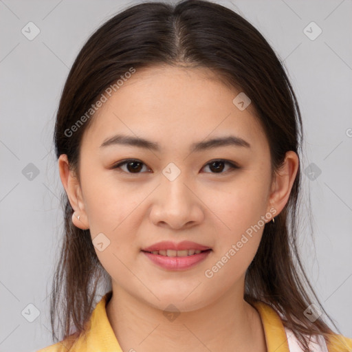 Joyful white young-adult female with medium  brown hair and brown eyes