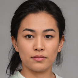 Neutral asian young-adult female with medium  brown hair and brown eyes