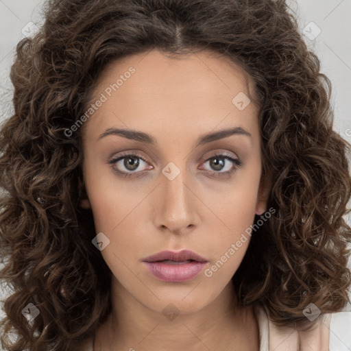 Neutral white young-adult female with long  brown hair and brown eyes