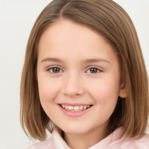 Joyful white child female with medium  brown hair and brown eyes