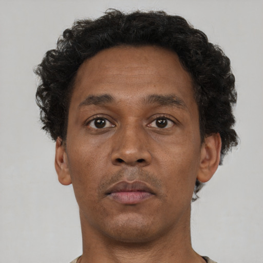 Neutral black adult male with short  brown hair and brown eyes