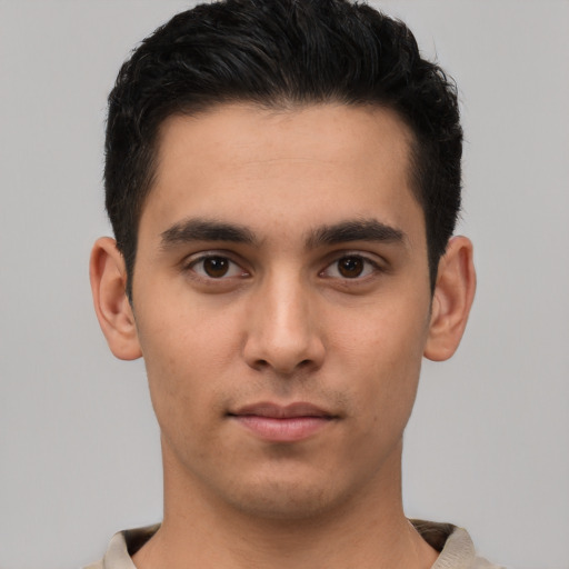 Neutral white young-adult male with short  brown hair and brown eyes