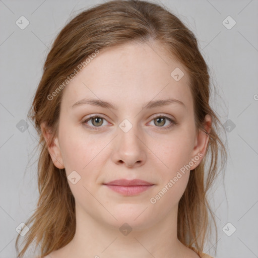 Joyful white young-adult female with medium  brown hair and blue eyes