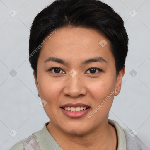 Joyful asian young-adult female with short  black hair and brown eyes