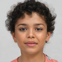 Joyful white child female with short  brown hair and brown eyes