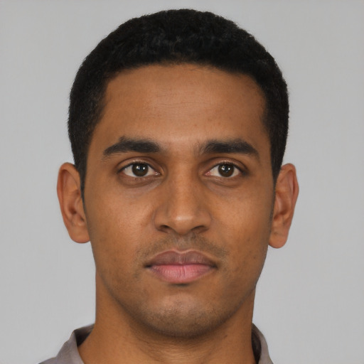 Neutral black young-adult male with short  black hair and brown eyes