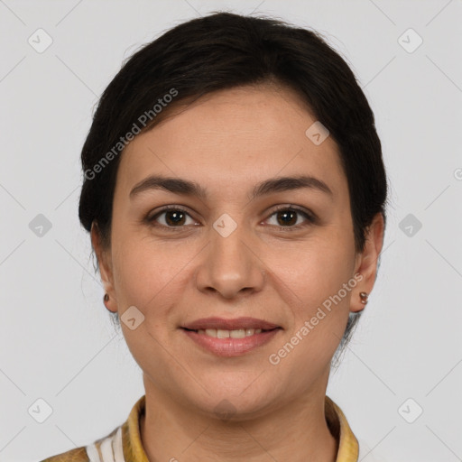 Joyful white young-adult female with medium  brown hair and brown eyes