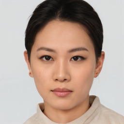 Neutral asian young-adult female with short  brown hair and brown eyes