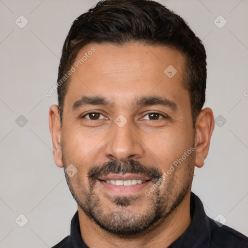 Joyful white young-adult male with short  black hair and brown eyes
