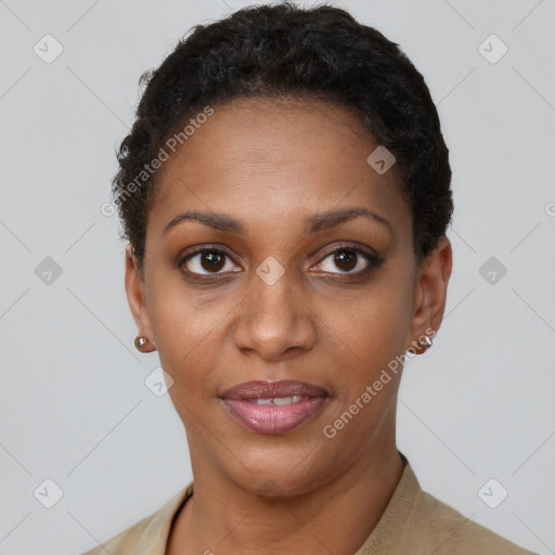 Joyful black young-adult female with short  brown hair and brown eyes
