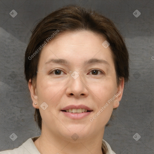 Joyful white adult female with short  brown hair and brown eyes