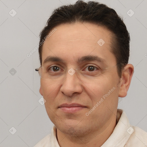 Joyful white adult male with short  brown hair and brown eyes