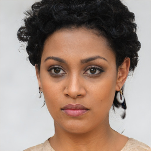 Neutral latino young-adult female with medium  black hair and brown eyes