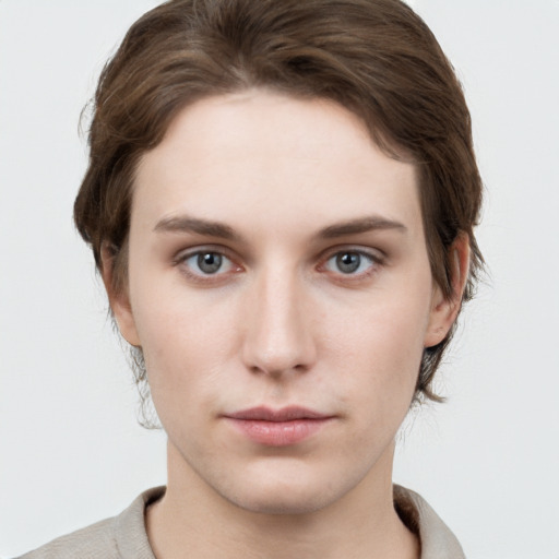 Neutral white young-adult female with short  brown hair and brown eyes