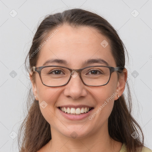 Joyful white young-adult female with long  brown hair and grey eyes