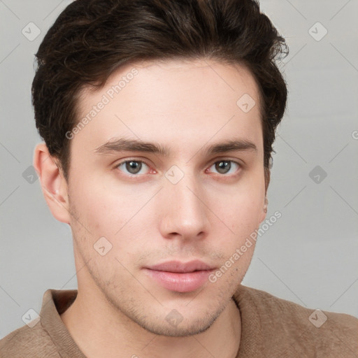 Neutral white young-adult male with short  brown hair and grey eyes