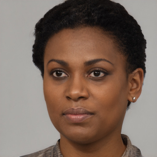 Neutral black young-adult female with short  black hair and brown eyes